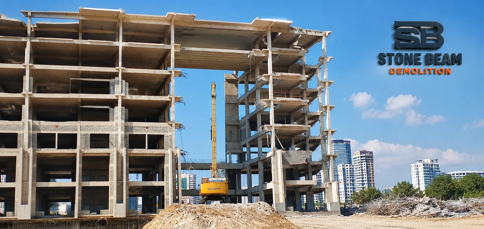 High-rise demolition in Dubai showing controlled building removal activities, demolition equipment and organised site operations